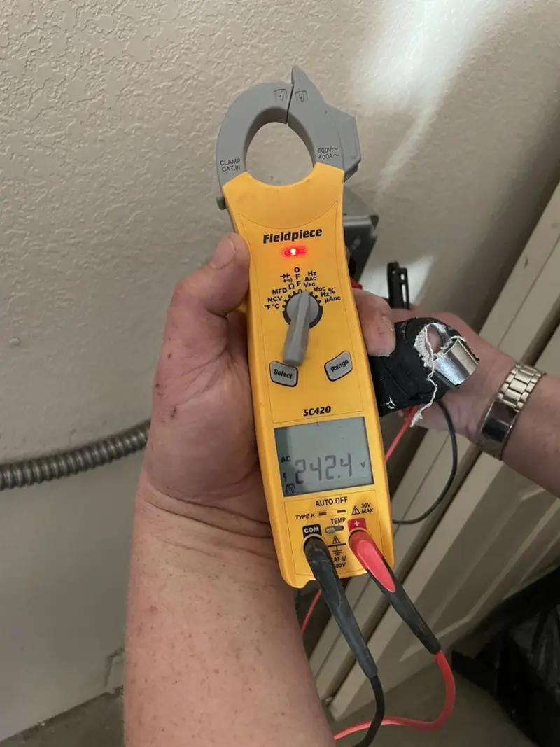 Voltage testing with clamp meter during Generator Installation in Jupiter Farms